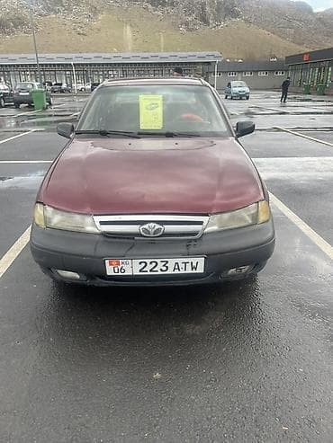 Daewoo Nexia: 1999 г., 1.5 л, Механика, Бензин, Седан