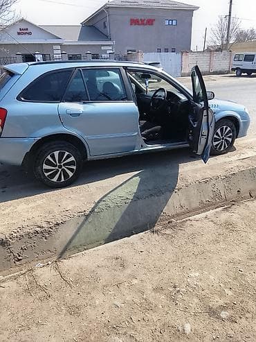 dewoo lanos: Mazda Familia: 2001 г., 1.5 л, Автомат, Бензин, Универсал — 7