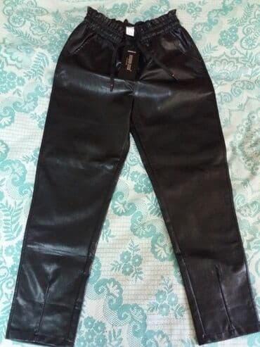 Брюки ж/е кожа с утеплителем размер-28 цена 2000сом . Новые