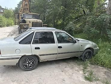 Daewoo Nexia: 2006 г., 1.6 л, Механика, Бензин, Седан