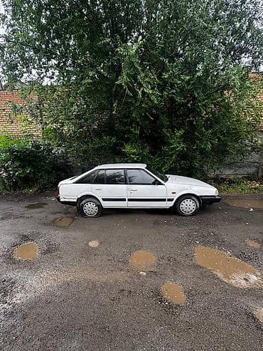 step rf3: Mazda 626: 1989 г., 2 л, Механика, Бензин, Седан — 1