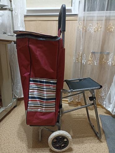 Продаю новую хозяйственную сумку тележку на колесах со стульчиком