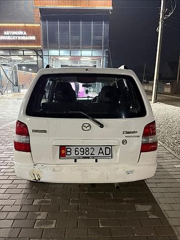 tesla model 3: Mazda Demio: 1999 г., 1.3 л, Автомат, Бензин, Хэтчбэк — 5