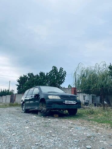 срочно продаю в связи с переездом: Mitsubishi Lancer: 2001 г., 1.8 л, Типтроник, Универсал — 6