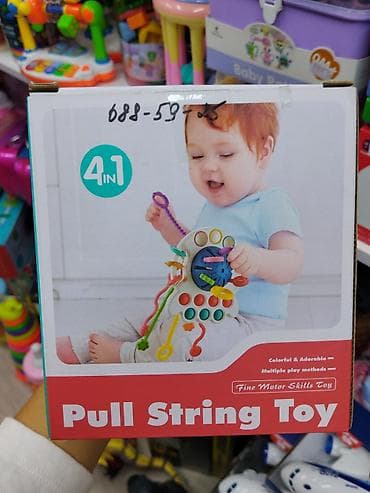 пупырышки: Игрушка для развития мелкой моторики “Pull String Toy” — 4-в-1. - — 1