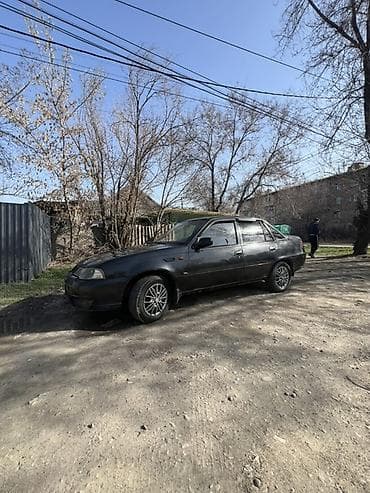 bmw 525 e39: Легковой седан черного цвета. Кузов: - 4 двери, классический седан - — 1