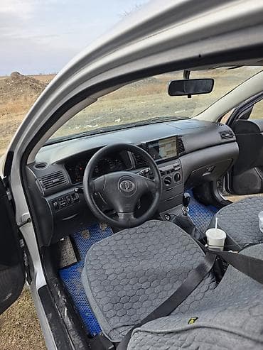 golf plus: Toyota Corolla: 2003 г., 1.6 л, Механика, Бензин, Хэтчбэк — 8