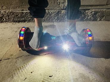 Электр транспорту: Гироскутер с яркой LED‑подсветкой колес и корпуса. Особенности: - — 5