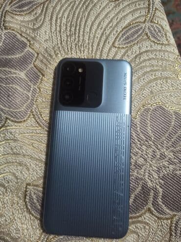 телефон в таласе: Tecno Spark, 32 ГБ, цвет - Голубой — 2