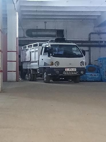 тигил: Буйрутма берүү Хендай портер, Тигүү калдыктарын чыгаруу, Жүк ташуучу жумушчусу менен — 2