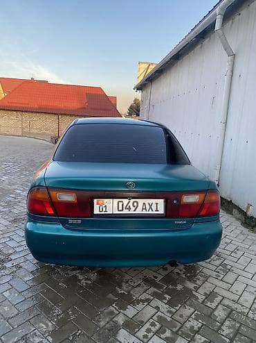 rx 590: Mazda 323: 1996 г., 1.6 л, Автомат, Газ, Седан — 5