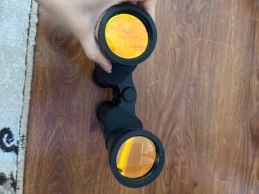 продаю связи с переездом: Бинокль 20x50, поле зрения 87 м/1000 м (направляющая маркировка — 5