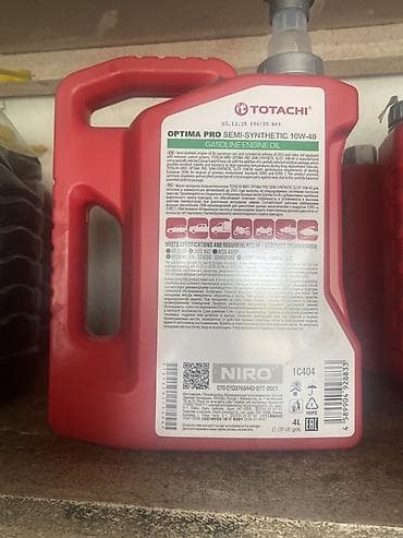 масло: TOTACHI Optima Pro Semi-Synthetic 10W-40 — полусинтетическое моторное — 1
