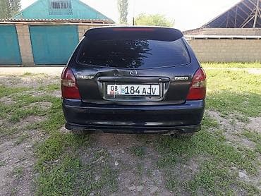 моторчик печки 124: Mazda 323: 2001 г., 2 л, Механика, Бензин, Хэтчбэк — 5