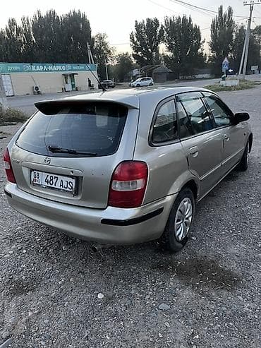 гофра для авто: Mazda Familia: 2002 г., 1.6 л, Механика, Бензин, Универсал — 4