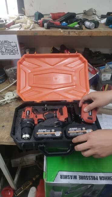 зарядка для шуруповерта: Универсальный набор аккумуляторного шуруповерта в прочном оранжевом — 1