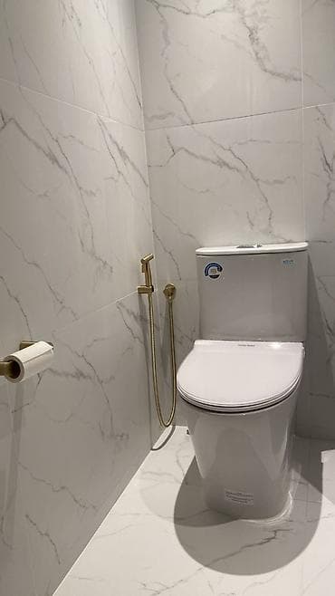 Плиточные работы под ключ: ванные комнаты и санузлы - Облицовка стен