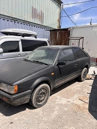 люк е36: Mazda 323: 1987 г., 1.5 л, Механика, Седан — 3