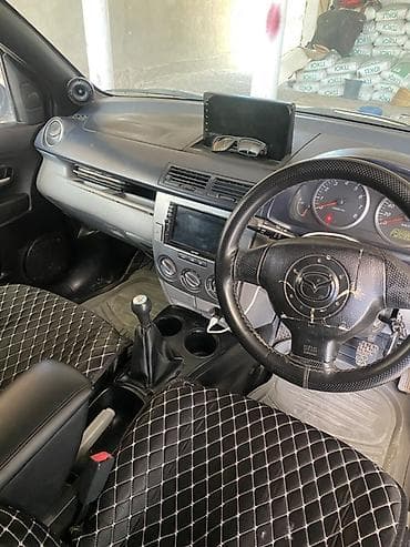 гитара мазда: Mazda Demio: 2004 г., 1.5 л, Механика, Бензин, Хэтчбэк — 7