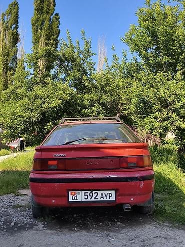 Продажа авто: Mazda 323: 1990 г., 1.6 л, Механика, Бензин, Хэтчбэк — 3