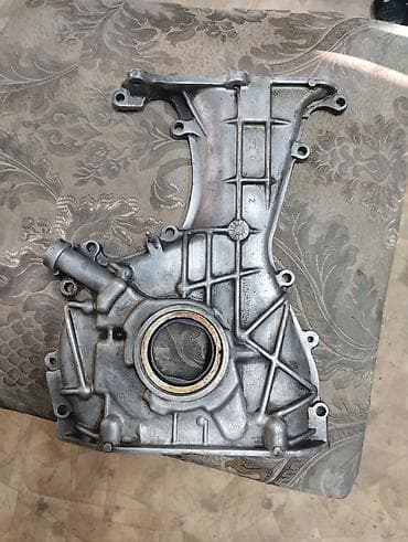 Передняя крышка двигателя (масляный насос в сборе) для Nissan. -