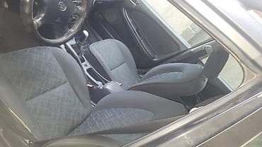 Toyota Avensis: 2002 г., 1.8 л, Кол менен иштөөчү, Бензин, Универсал — 4