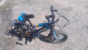 Велосипеды: Детский велосипед б/у с дополнительными боковыми колёсами. - Диаметр — 1