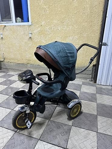 Детский трехколесный велосипед‑коляска с родительской ручкой -