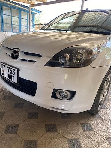 гитара мазда: Mazda Demio: 2004 г., 1.5 л, Механика, Бензин, Хэтчбэк — 5