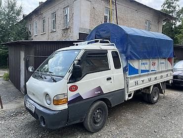 ручной машина: Hyundai Porter — компактный бортовой грузовик с тентованным кузовом — 5