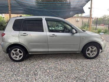 машина самара: Mazda Demio: 2003 г., 1.3 л, Автоматтык, Бензин, Универсал — 8