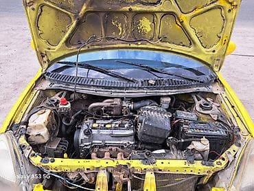 авто компании: Daihatsu Sirion: 1998 г., 1 л, Механика, Бензин, Хэтчбэк — 7