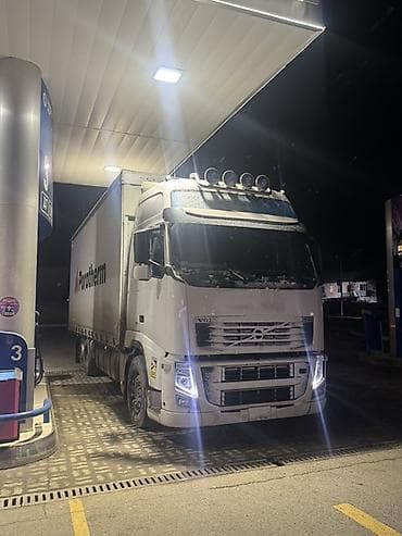 matiz 2010: Тягач, Volvo, 2011 г., Тентованный — 2