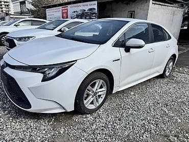 шильдик гибрид: Toyota Levin: 2021 г., 1.8 л, Вариатор, Гибрид, Седан — 3