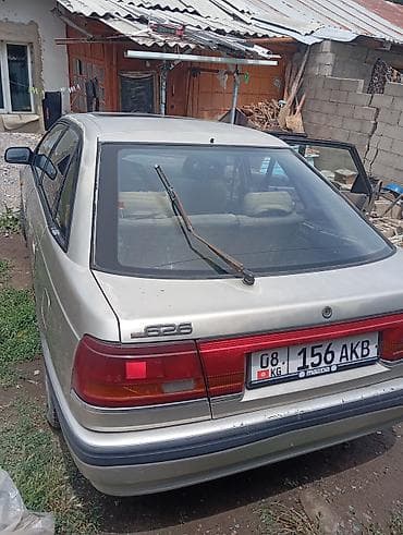 Унаа: Mazda 626: 1991 г., 2 л, Кол менен иштөөчү, Бензин, Хетчбек — 3