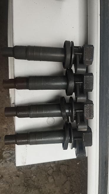 пасса: Катушка зажигания Toyota 2005 г., Б/у, Оригинал — 1