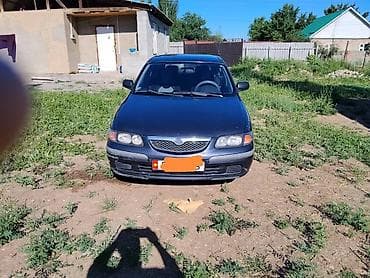 зеркала: Mazda 626: 1998 г., 0.2 л, Механика, Бензин, Хэтчбэк — 1