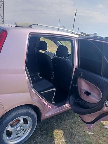 Продажа авто: Daihatsu Cuore: 2004 г., 1 л, Механика, Хэтчбэк — 10