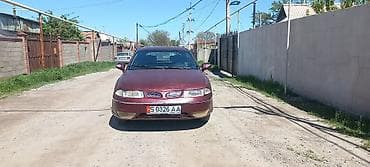 mersedes milenium: Mitsubishi Carisma: 1997 г., 1.6 л, Автомат, Бензин, Седан — 4