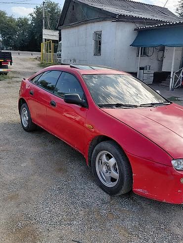тканевый: Mazda Lantis: 1997 г., 1.5 л, Механика, Бензин, Хэтчбэк — 2