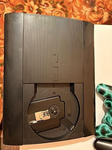 PS3 (Sony PlayStation 3): PlayStation 3 Super Slim (модель CECH-4003C) - Оригинальная консоль — 1