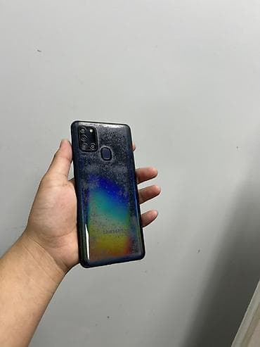 google pixel fold: Смартфон Samsung Galaxy A21s (серия A). - Экран с вырезом под — 3