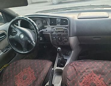 tsunami 100: Nissan Primera: 2000 г., 1.8 л, Механика, Бензин, Универсал — 6