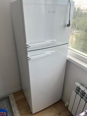 Холодильник BEKO, двухкамерный, белый. - Раздельные двери: верхняя — — 1