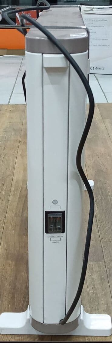 с подогревом: Масляный обогреватель Кол-во секций: 10 и более, Умный дом, Отключение при перегреве, Отключение при падении — 3