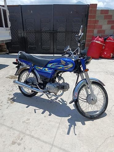 Унаа: Honda CD70 (под брендингом Honda Dream) - Тип: легкий городской — 2