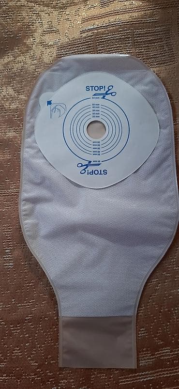 Однокомпонентный вырезаемый калоприемник (стома-пакет) с отверстиями