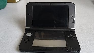 Nintendo 3DS XL, состояние хорошее, есть небольшие царапины на задней