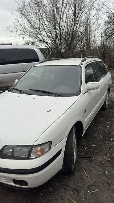 ас машина: Mazda Familia: 1999 г., 1.8 л, Механика, Бензин, Универсал — 3