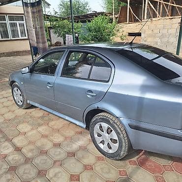 скутеры токмок: Skoda Octavia: 2004 г., Седан — 2